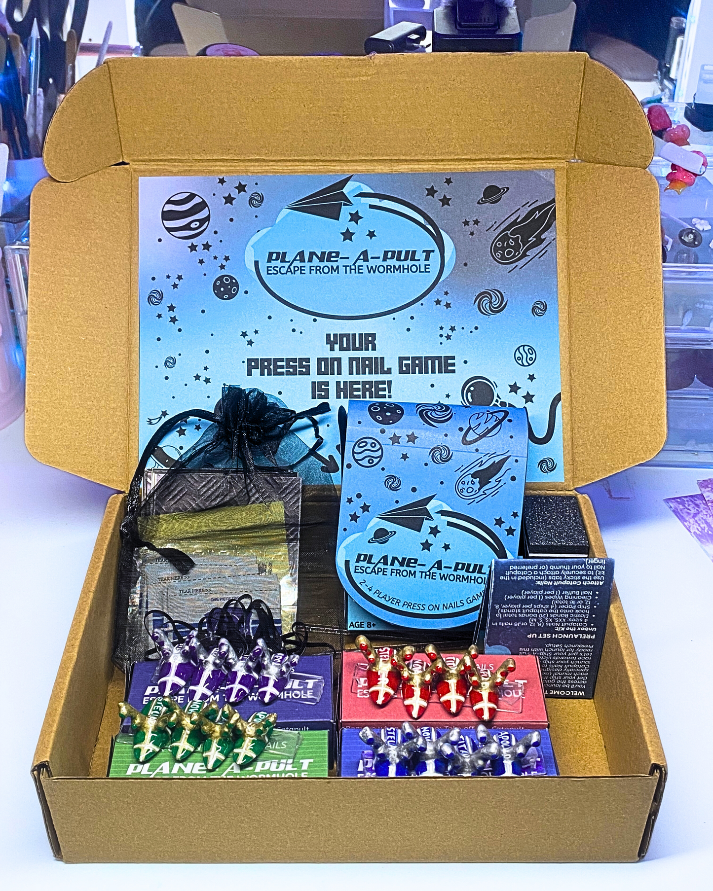 PLANE-A-PULT: Escape From The Wormhole – Press On Nails Game Kit