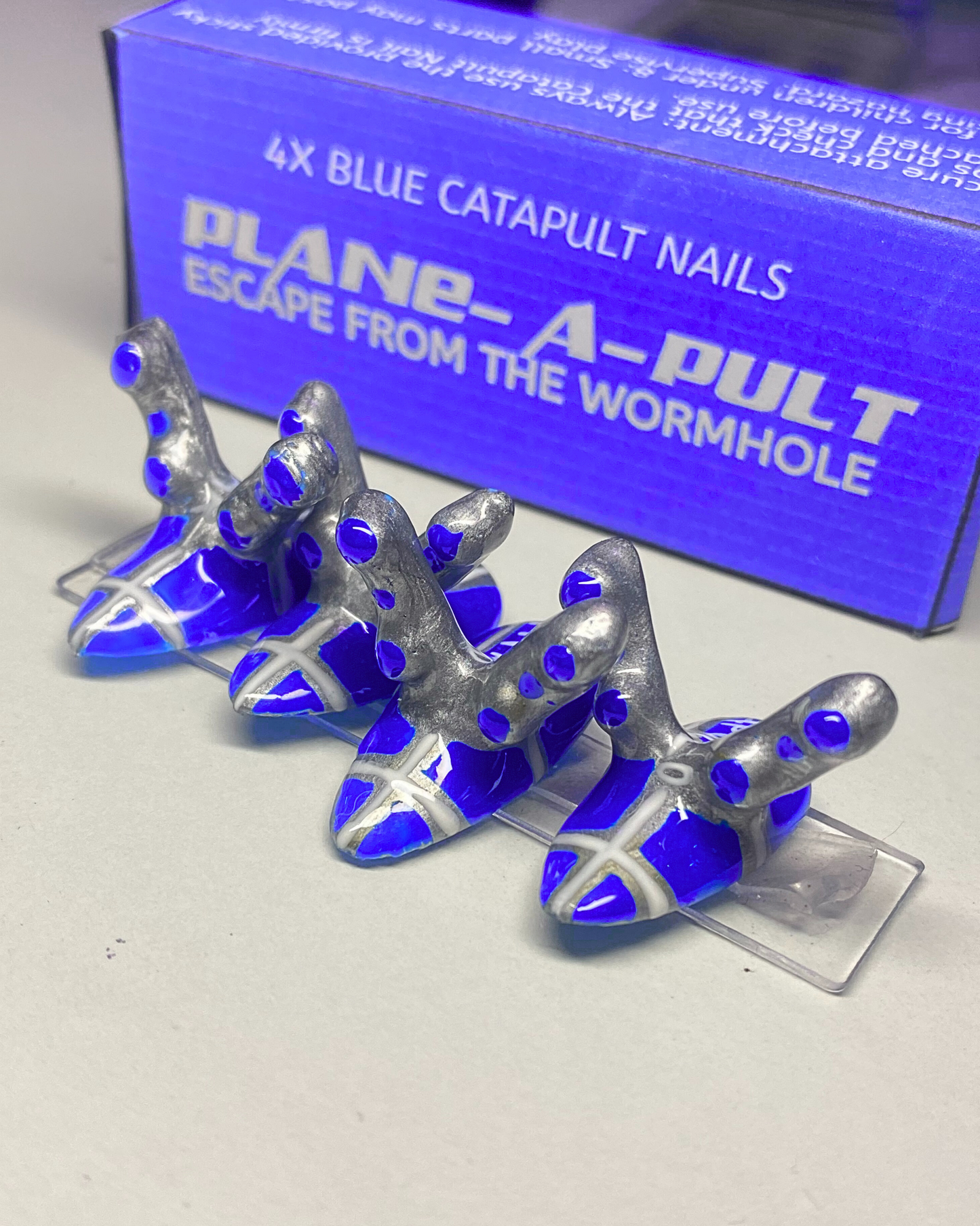 PLANE-A-PULT: Escape From The Wormhole – Press On Nails Game Kit